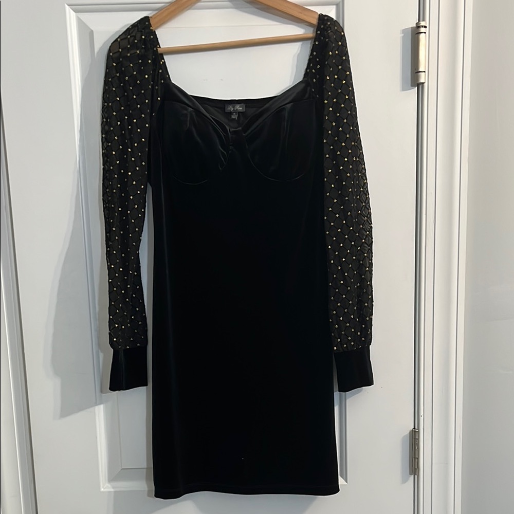 Elegant Black Dress with Embellished Sleeves